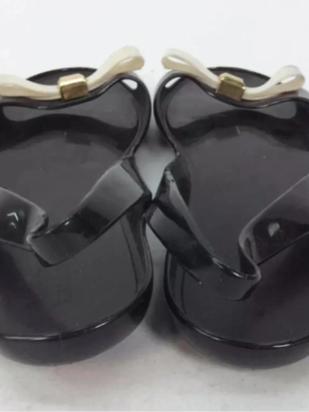 kate spade Black Jelly Flats with Cream Bow and Gold Accent
